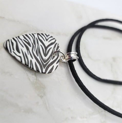 Black and White Zebra Print Guitar Pick Necklace on Black Suede Cord