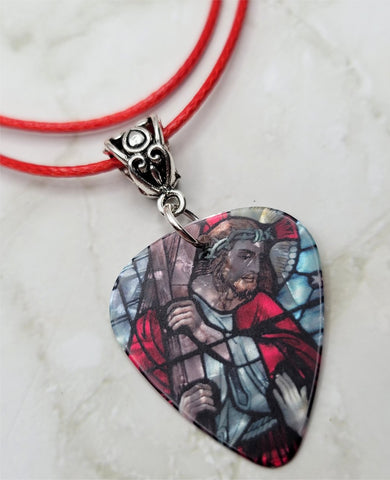 Jesus Carrying His Cross Guitar Pick Necklace on Red Rolled Cord