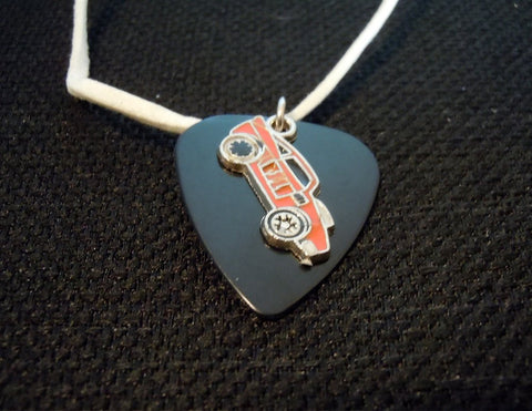 Transparent Black Guitar Pick with an Orange Race Car Charm on a White Suede Cord Necklace