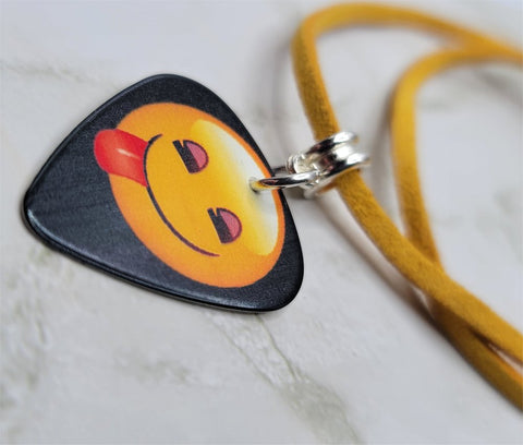 Tongue Sticking Out Emoji Guitar Pick Necklace on Mustard Yellow Suede Cord