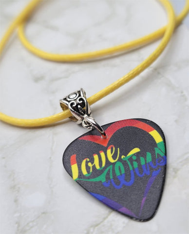 Love Wins Pride Guitar Pick Necklace with Rolled Yellow Cord