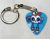 Skeleton with a Boombox and Baseball Cap Guitar Pick Keychain