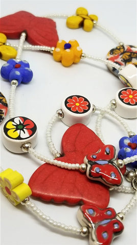 Magnesite Butterflies and Flower Beads on A White Seed Bead Necklace