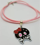 Black and Pink Skull with Red Bow Charm Necklace on a Pink Suede Cord