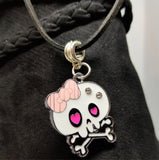 White and Pink Skull and Pink Bow Charm Necklace on a Black Suede Cord