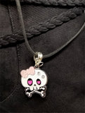 White and Pink Skull and Pink Bow Charm Necklace on a Black Suede Cord