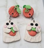 Large Ghost Polymer Clay Earrings Holding A Pumpkin
