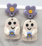 Large Ghost Polymer Clay Earrings Holding Flowers
