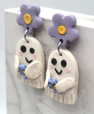 Large Ghost Polymer Clay Earrings Holding Flowers