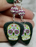 Fuchsia and Green Decorated Sugar Skull Guitar Pick Earrings with White and Fuchsia Striped Pave Beads