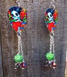 Sugar Skull Surrounded By Flowers Holding a Heart Guitar Pick Earrings with Dangles